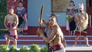 Māori performers in traditional dress performing the haka war dance at Te Puia Cultural Centre