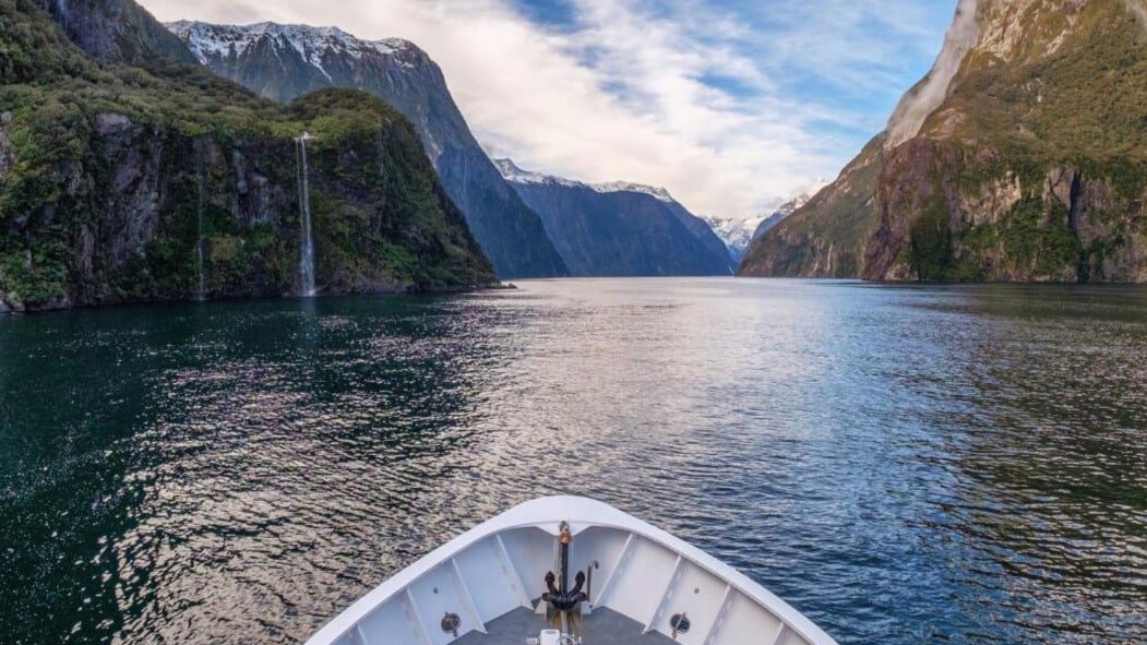Looking over the front of the boat cruising through Milford Sound