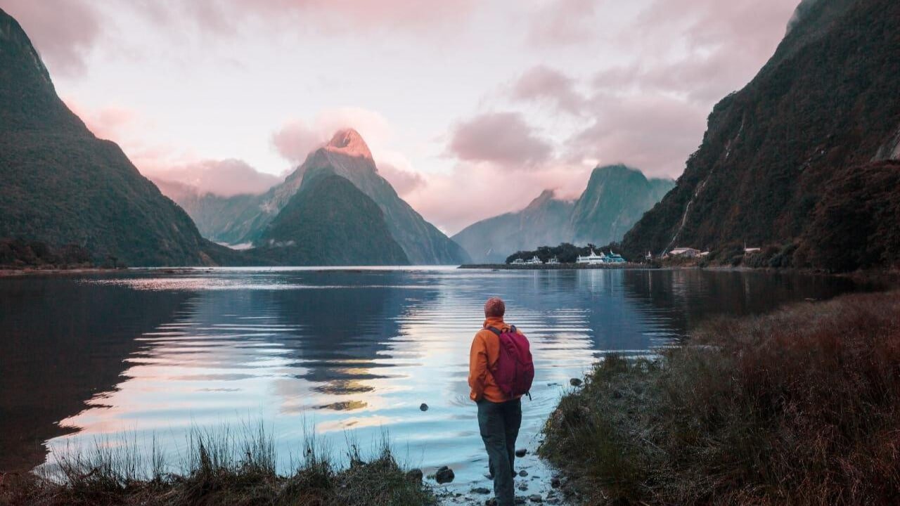 Shimmering water and reflections of mountains at Milford Sound