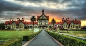 Historic building surrounded by lush gardens in Rotorua Government Gardens, New Zealand