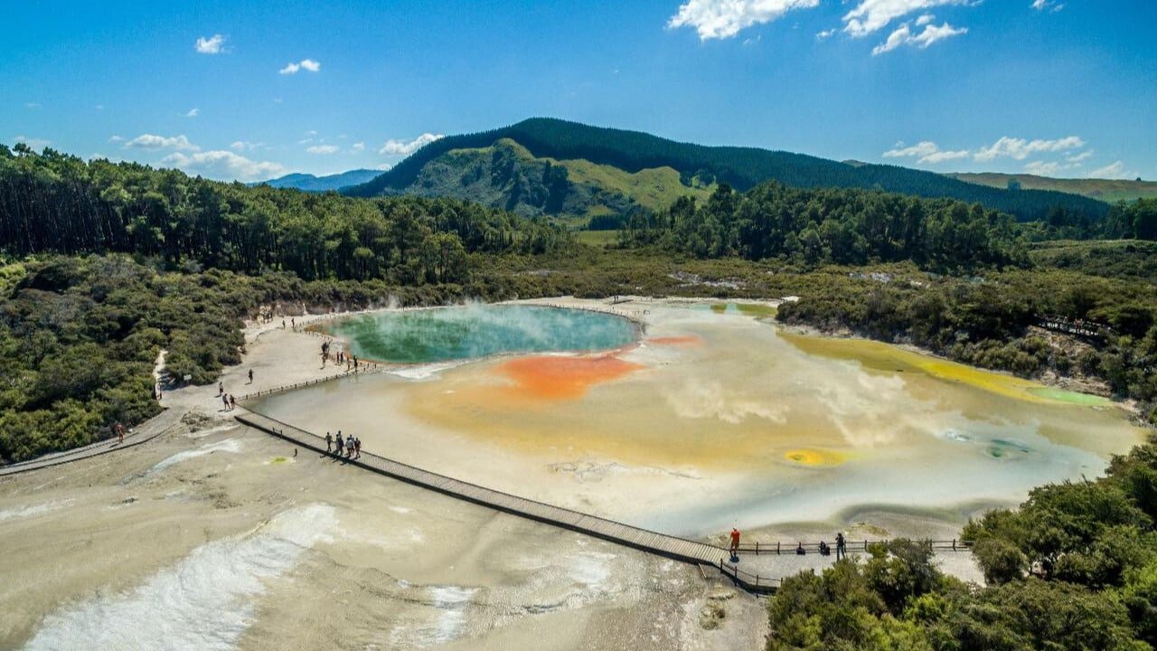 Scenic boardwalk and viewing platforms winding through geothermal activity at Wai-O-Tapu, Rotorua