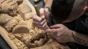 Close-up of a traditional Māori wood carving in Rotorua