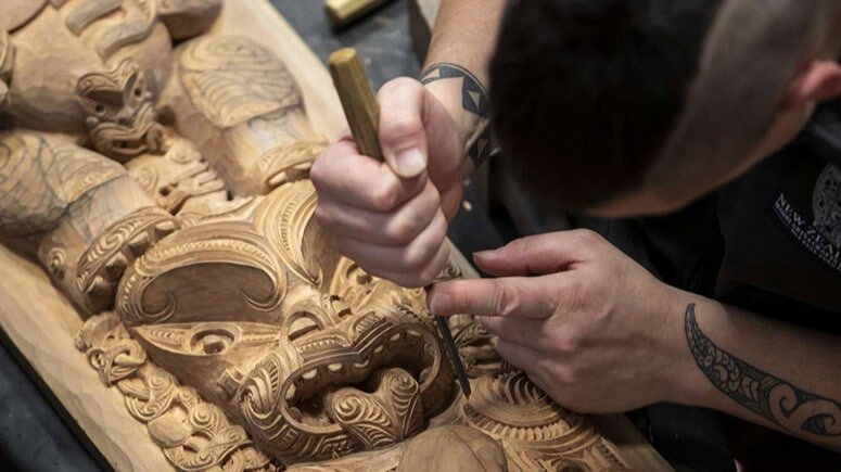 Close-up of a traditional Māori wood carving in Rotorua