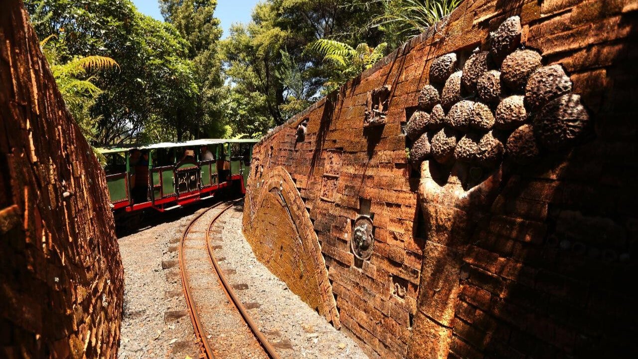 Miniature train on the tracks at Driving Creek Railway in Coromandel, New Zealand