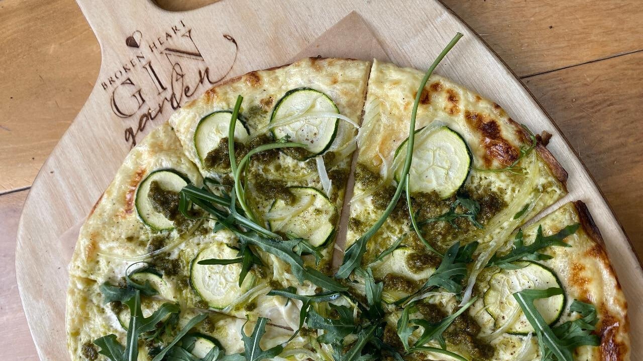 A delicious Broken Heart pizza served in the gin garden during the Queenstown Gin Tour.