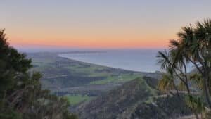 Golden sunset over mountain ranges from Kaikōura zipline platform
