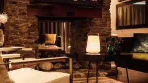 Comfortable living area with seating at Maruia River Retreat accommodation