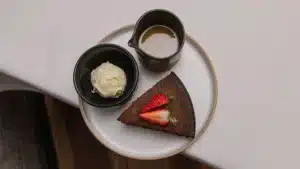 Beautifully plated indulgent dessert at Maruia River Retreat
