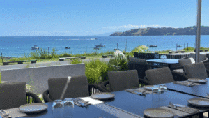 Boats on a sunlit bay viewed from Kimaha Restaurant on Waiheke Island